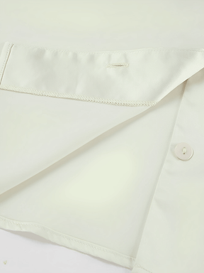 Camisa Feminina Acetinada com Gola Laço e Manga Longa Flare – Betania