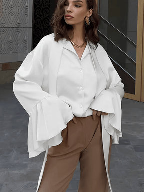 Camisa Feminina Acetinada com Gola Laço e Manga Longa Flare – Betania