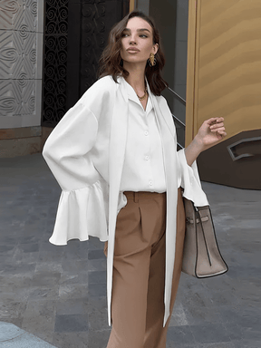 Camisa Feminina Acetinada com Gola Laço e Manga Longa Flare – Betania